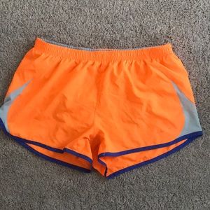 Nike orange running shorts